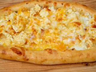 close-up of delicious ready-made khachapuri. Side view