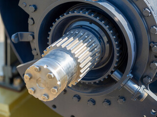 Close-up of the gear shaft of the motor for the ship. Metal, teeth, technology.