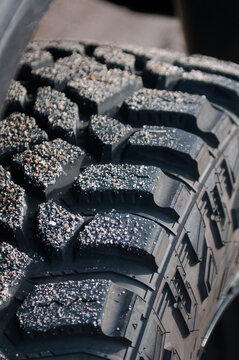 Off road tire with dirty treads on truck