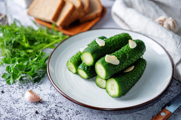 Pickled cucumbers with dill and garlic slices