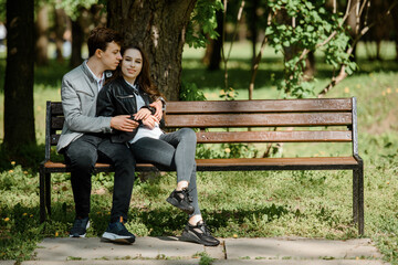 Fototapeta premium Young happy beautiful couple in the street.