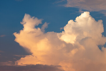 Beautiful stormy cumulus clouds in the sky, background.