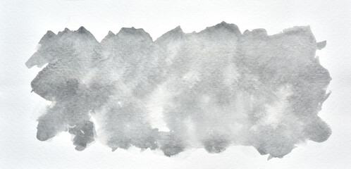 a photo image of abstract gray watercolor on paper, hand paint of gray watercolor for background, wet technique on paper
