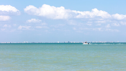 Boat rides over San Carlos Bay background Fort Myers Beach