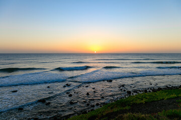 Sunset in Gran Canaria on Canary Island beach and waves