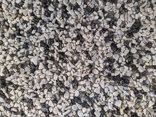 very small black and gray stones closeup photo