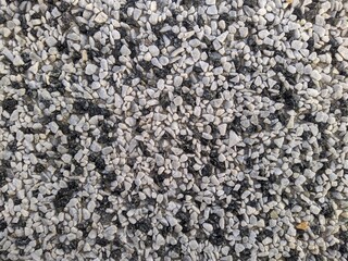 very small black and gray stones closeup photo