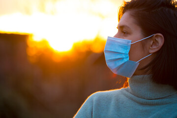 Portrait of a young woman in a medical mask. Mask face woman. Virus. 