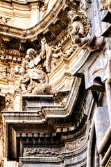 Tower bell, sculptures and carved stone details of the Cathedral of Murcia
