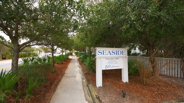 Welcome to sign for small coastal city town of Seaside Florida at Gulf of Mexico established in 1981 with main road street