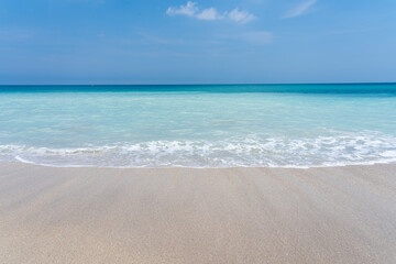 Runaway wave on an ocean beach in Florida in the spring. Turquoise ocean and perfect fine sand Melbourne Beach