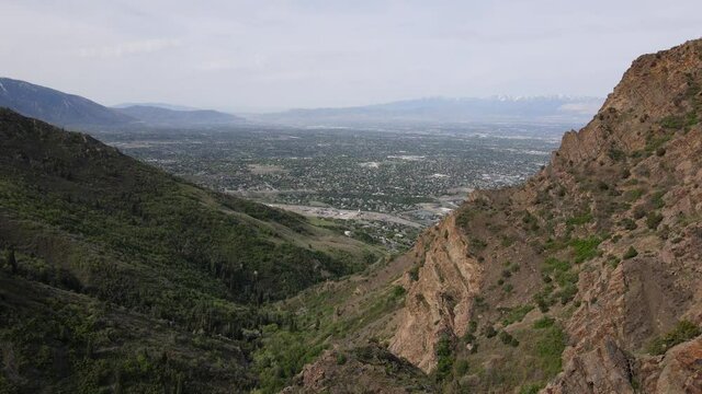 Drone flying toward Salt Lake Valley from the beautiful eastern mountain range