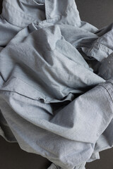 casual dress shirt fabric texture - photographed from above in a flat lay style