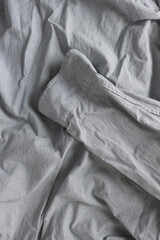 casual dress shirt fabric texture - photographed from above in a flat lay style