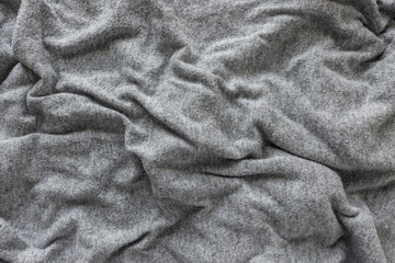 wooly sweater background - photographed from above with low or raking light - emphasis on texture...
