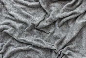 wooly sweater background - photographed from above with low or raking light - emphasis on texture...