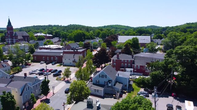 Amesbury historic downtown aerial view on Main Street including Market Square, Market Street Baptist Church and historic mill buildings in city of Amesbury, Massachusetts MA, USA.  