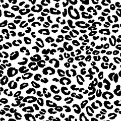 Abstract modern leopard seamless pattern. Animals trendy background. Black and white decorative vector illustration for print, card, postcard, fabric, textile. Modern ornament of stylized skin
