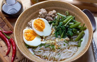 The tasty look noodle soup serving in a bowl