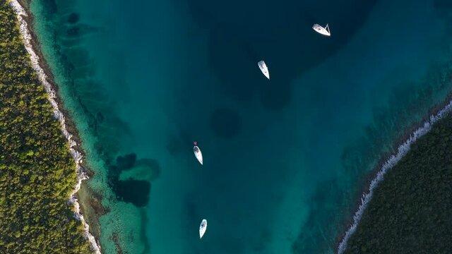 Sailboats On The Adriatic Sea In Between Mainland Of Dugi Otok Island In Croatia. aerial   