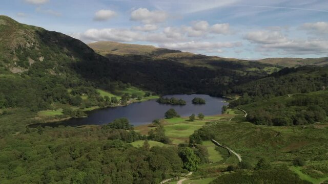 Drone shot panning into a scenic view of Rydal in English The Lake District. Stock footage video clip