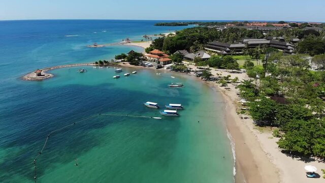 Beautiful view of white sand beach of luxury resorts, Tanjung Benoa, Bali.