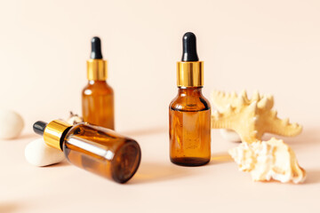 Set of facial serum in glass bottles with pipette, natural organic spa cosmetic. Skin care concept