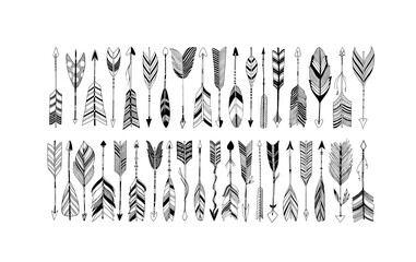 Rustic decorative arrows with feathers elements. Set of boho arrows with different tips and plumage. Hand drawn vintage vector collection. Vector black doodle elements isolated on white background