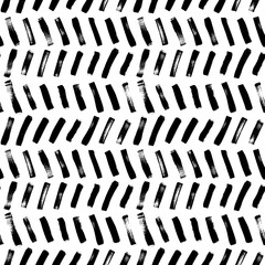 Herringbone brush strokes vector seamless pattern. Chevron texture or wallpaper. Grunge geometric pattern, hand drawn tribal vector background. Graphic diagonal brush strokes, zig zag ink illustration