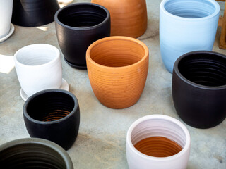 Various colorful plant pots in the shop.