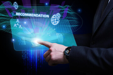Business, Technology, Internet and network concept. Young businessman working on a virtual screen of the future and sees the inscription: Recommendation