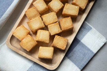 Diced fish tofu in wooden plate