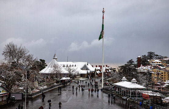beautiful view of shimla city and mall road after snowfall.
