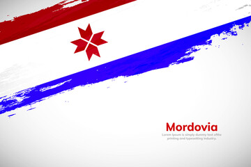 Obraz na płótnie Canvas Brush painted grunge flag of Mordovia country. Hand drawn flag style of Mordovia. Creative brush stroke concept background