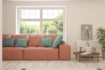 Fototapeta premium White living room with sofa and summer landscape in window. Scandinavian interior design. 3D illustration