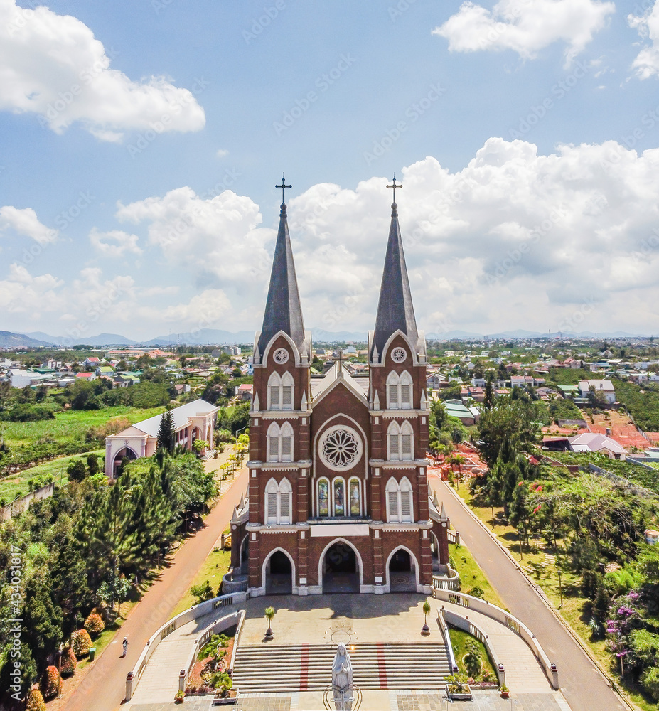 Wall mural Aerial view of Church of the Holy Mother (another name is Thanh Mau church) in Bao Loc Town, Lam Dong, Vietnam.