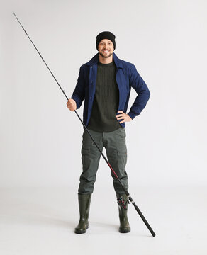 Man With Fishing Rod On White Background