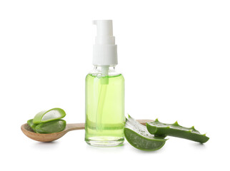 Bottle of natural cosmetic and spoon with aloe pieces on white background