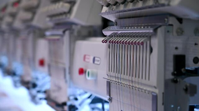 Automatic CNC embroidery machine during operation