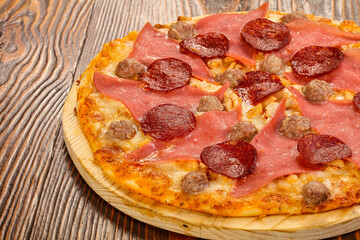 Pizza with ham and pepperoni