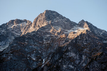 Amazing natural landscape in the mountains. Rocky birch on Morskie Oko lake in the High Tatras Mountains, Poland.