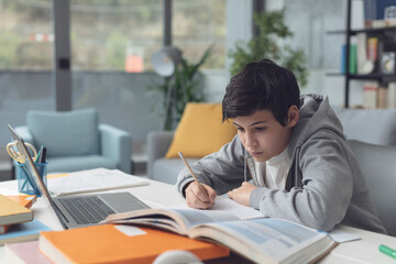 Focused student doing his homework