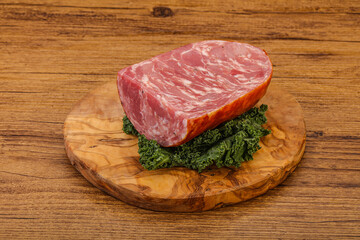 Beef ham piece over board