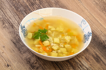 Tasty chicken soup with carrot