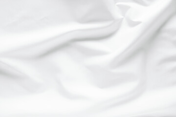Abstract white fabric texture background. Cloth soft wave. Creases of satin, silk, and cotton.