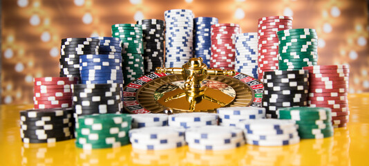 Fototapeta na wymiar Casino Poker Chips and roulette