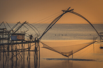 Fishermen in Songkhla Lake early in the morning.