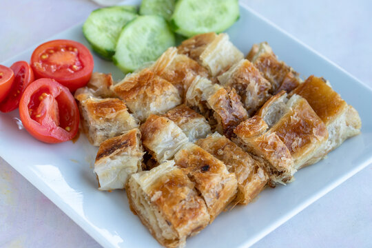 Turkish style meat stuffed filo dough borek served kol boregi.