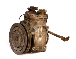used old automotive air conditioning compressor on white background. Car parts, Auto parts