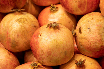 Organic pomegranate. Close-up pomegranate background